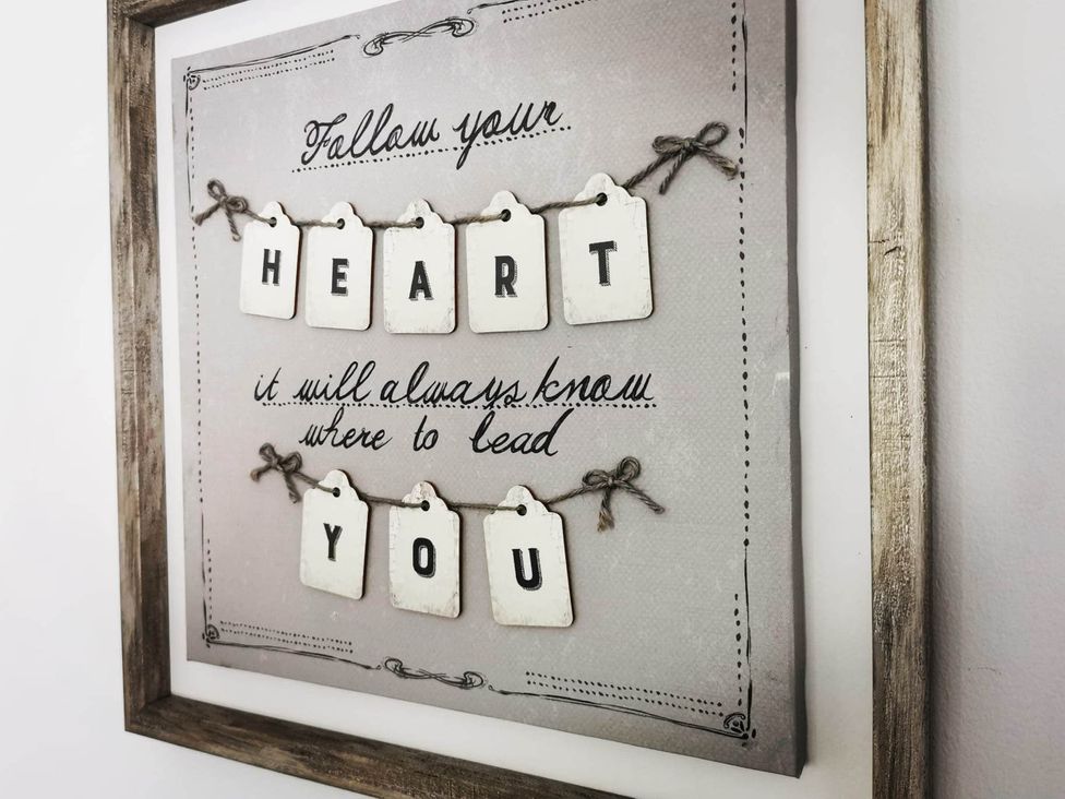 A wall art with text and tags at Stunning 2-Bed House in Macclesfield Cheshire