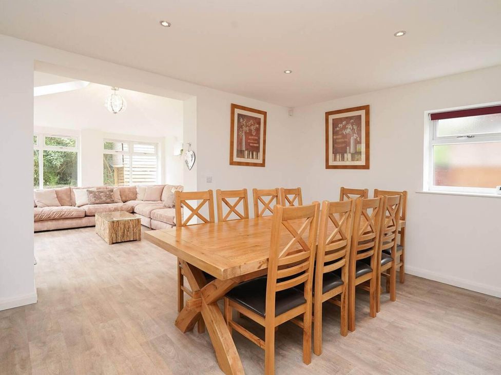 A dining room with a table and chairs at Rent My Spa Home with Pool table, Hottub and Sauna Chesterfield