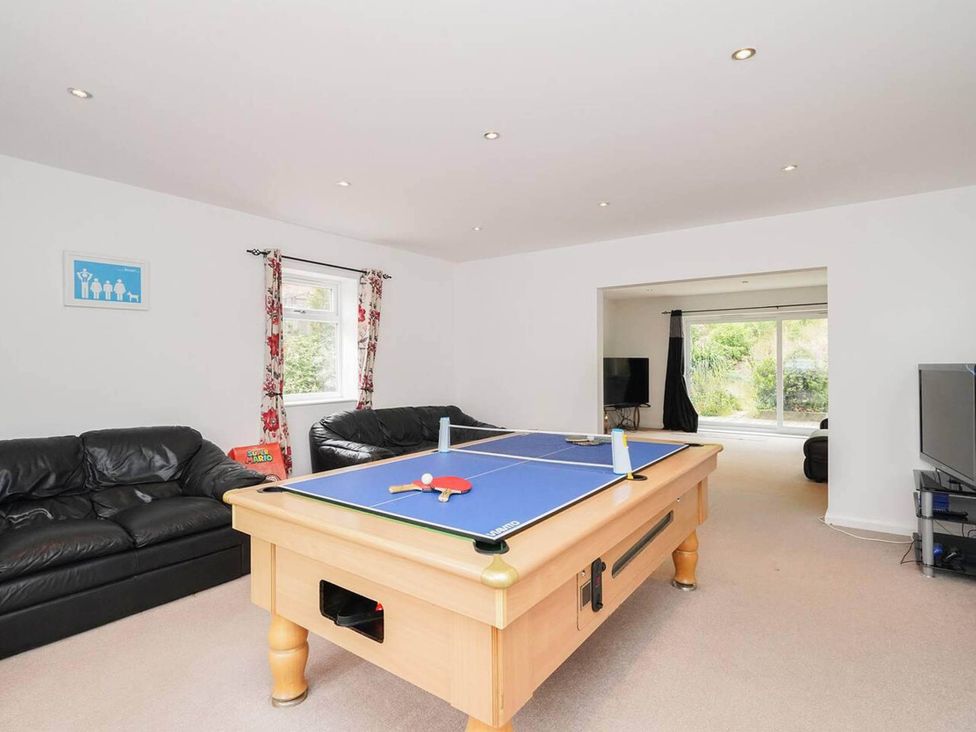 A snug with a pool table and sofas at Rent My Spa Home with Pool table, Hottub and Sauna Chesterfield