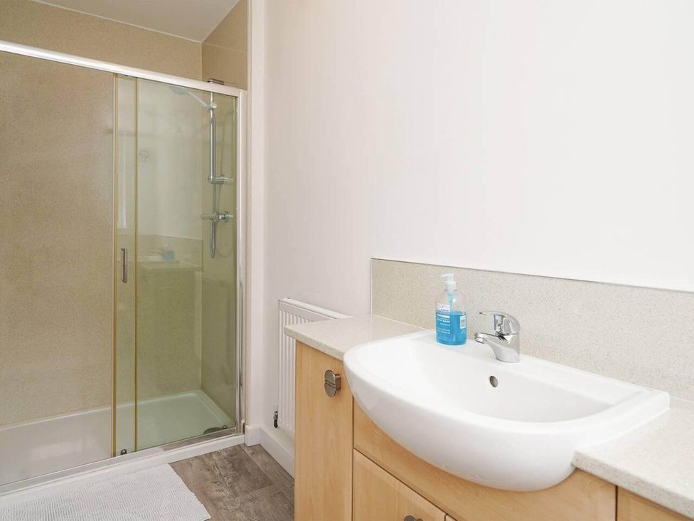 A bathroom with a shower and sink at Rent My Spa Home with Pool table, Hottub and Sauna in Chesterfield