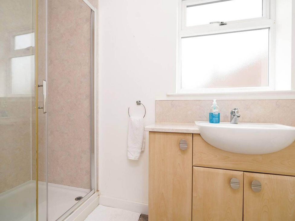 A bathroom with shower and sink at Rent My Spa Home with Pool table, Hottub and Sauna Chesterfield