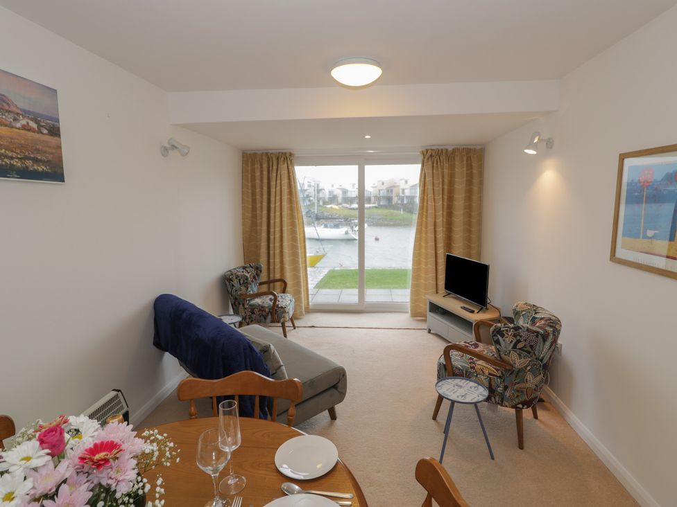 A living room with a view of the water at 10 Oakley Wharf Porthmadog