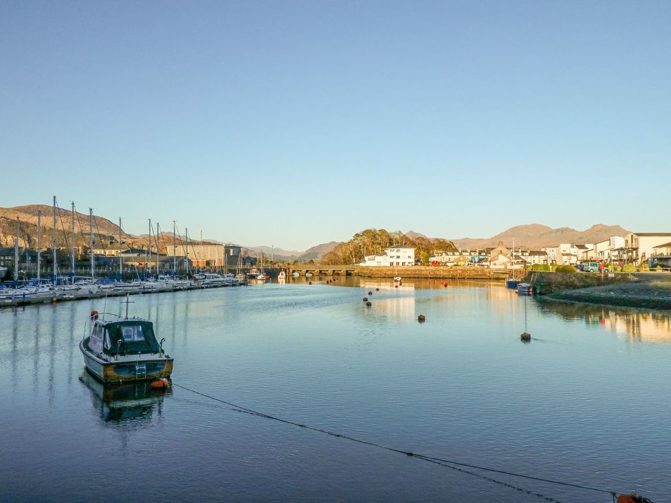 A marina with boats on the water at 10 Oakley Wharf Porthmadog