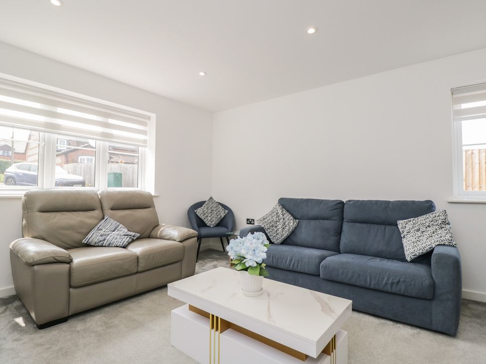 A living room with sofas and a coffee table at 1 Brunel Court
