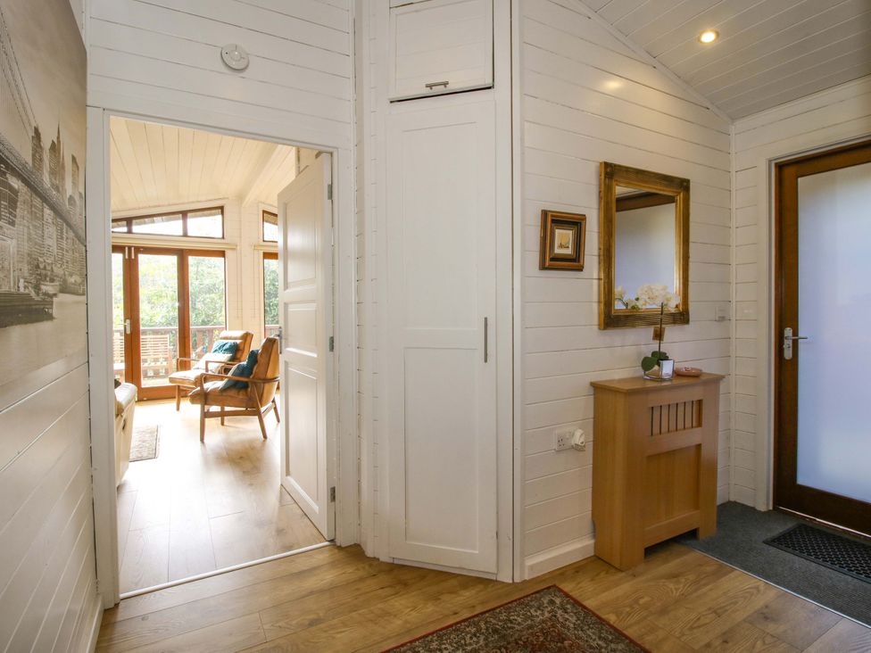 A hallway with a mirror and console table at No.14 Astbury Falls Luxury Retreat, Bridgnorth