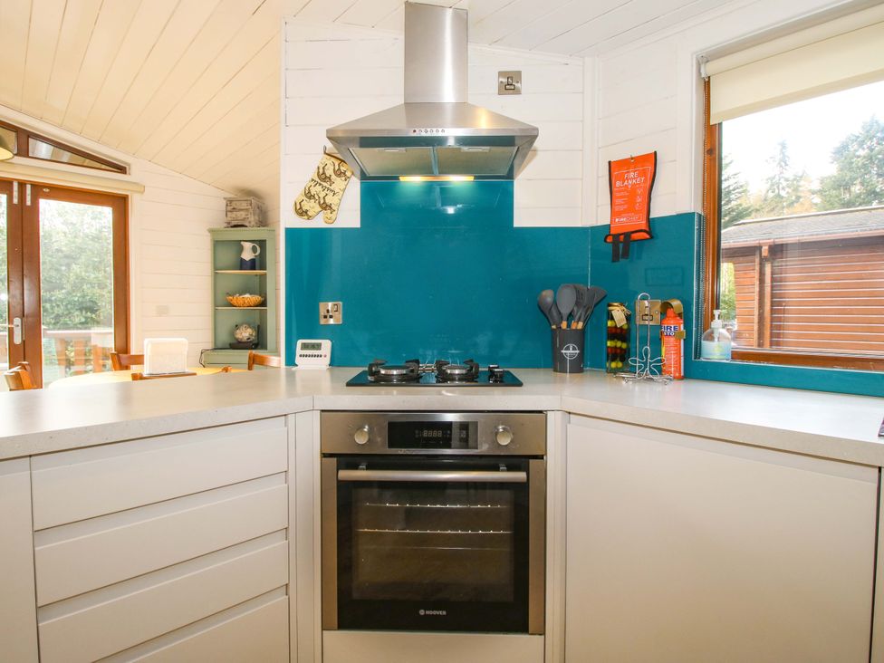 A kitchen with an oven and hob at No.14 Astbury Falls Luxury Retreat in Bridgnorth