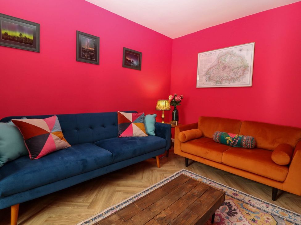 A living room with two sofas and a coffee table at Evansford in Ballater