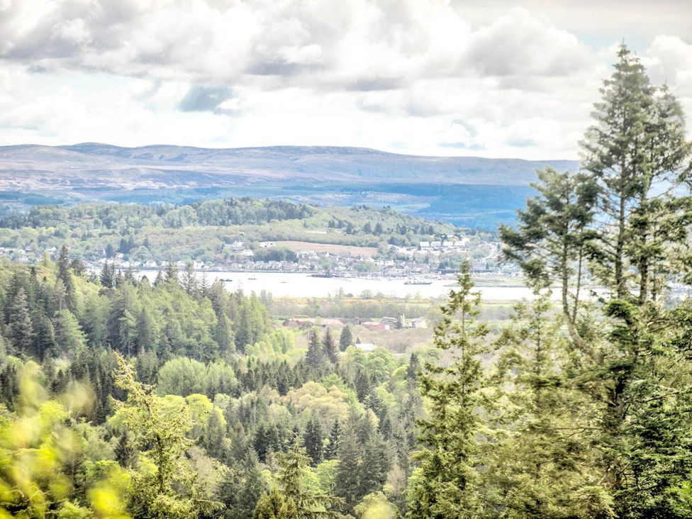 A scenic view of trees and hills overlooking water at Argyll Farmhouse-Idyllic Setting-Sleeps10 in Dunoon