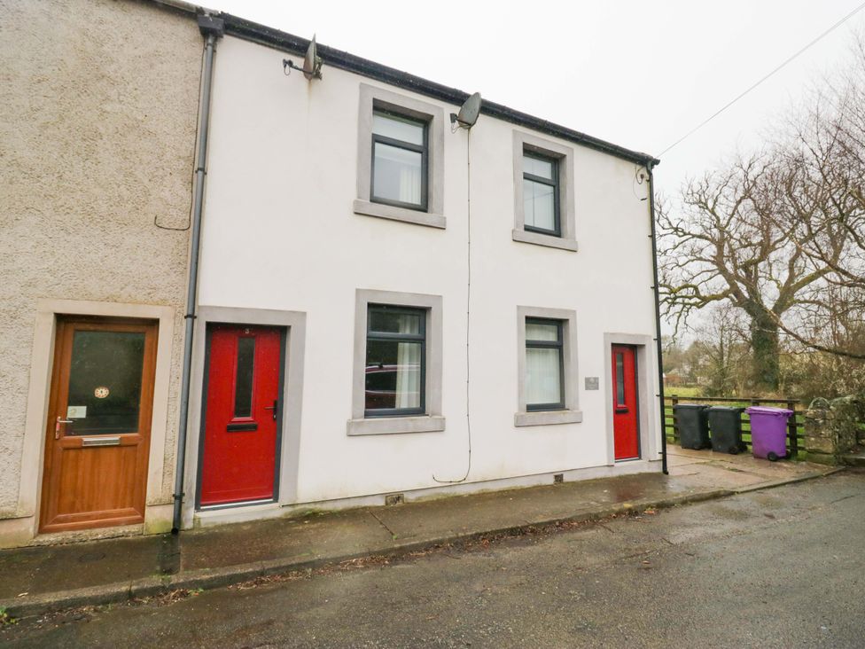 A house with red doors and windows in Ennerdale at Tethera