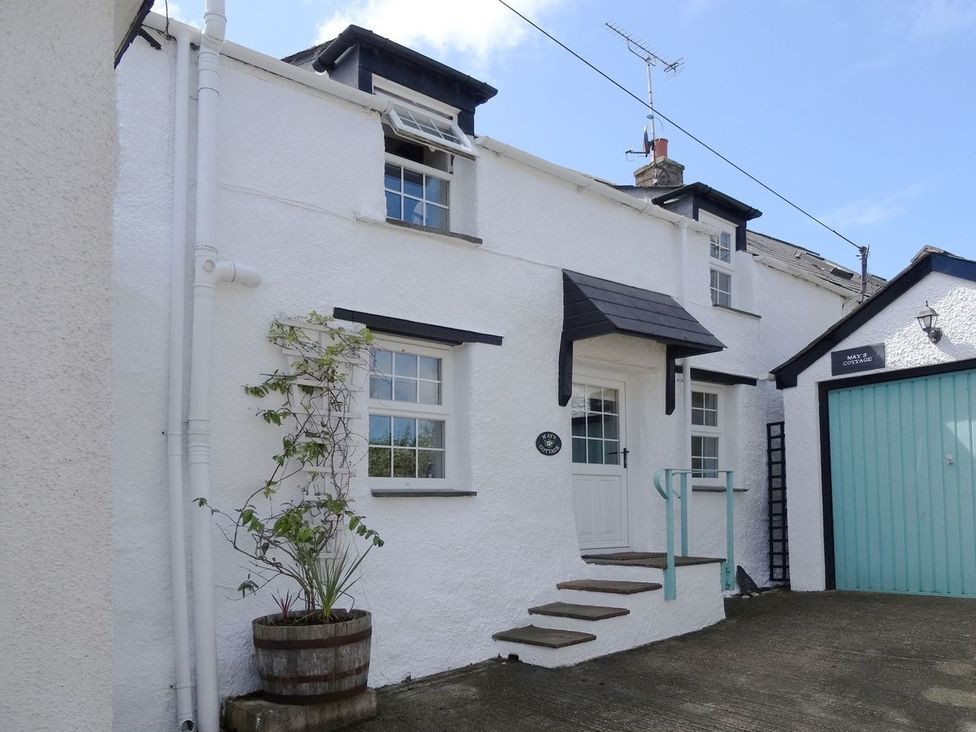 A cottage exterior with a front door and windows at Mays Cottage Wadebridge