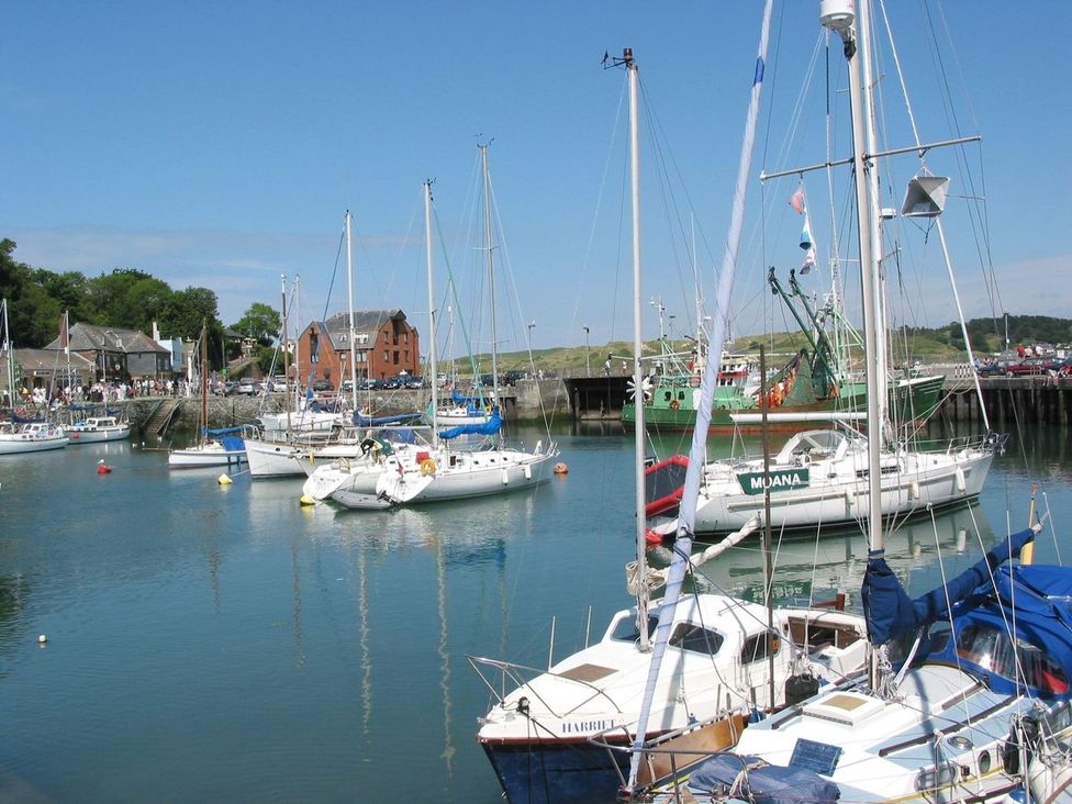 A view of boats in a harbor at Mays Cottage in Wadebridge