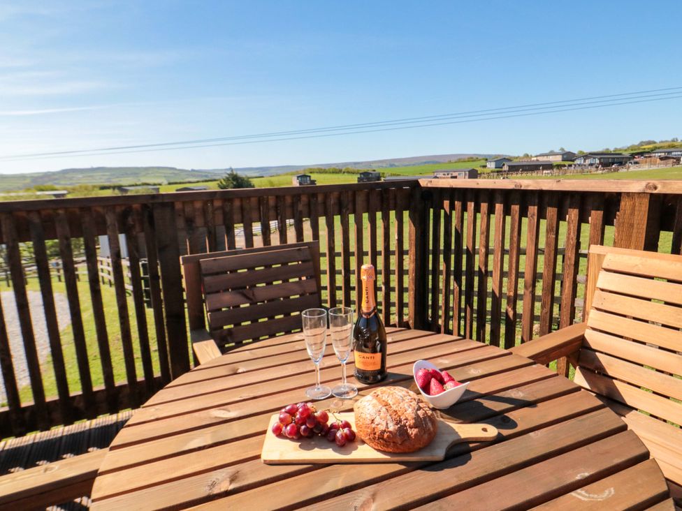An outdoor table with drinks and snacks at Heather Heights in Whitby
