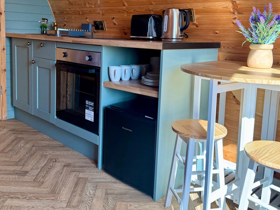 A kitchen with an oven and kettle at Rosemary Retreat in Whitby