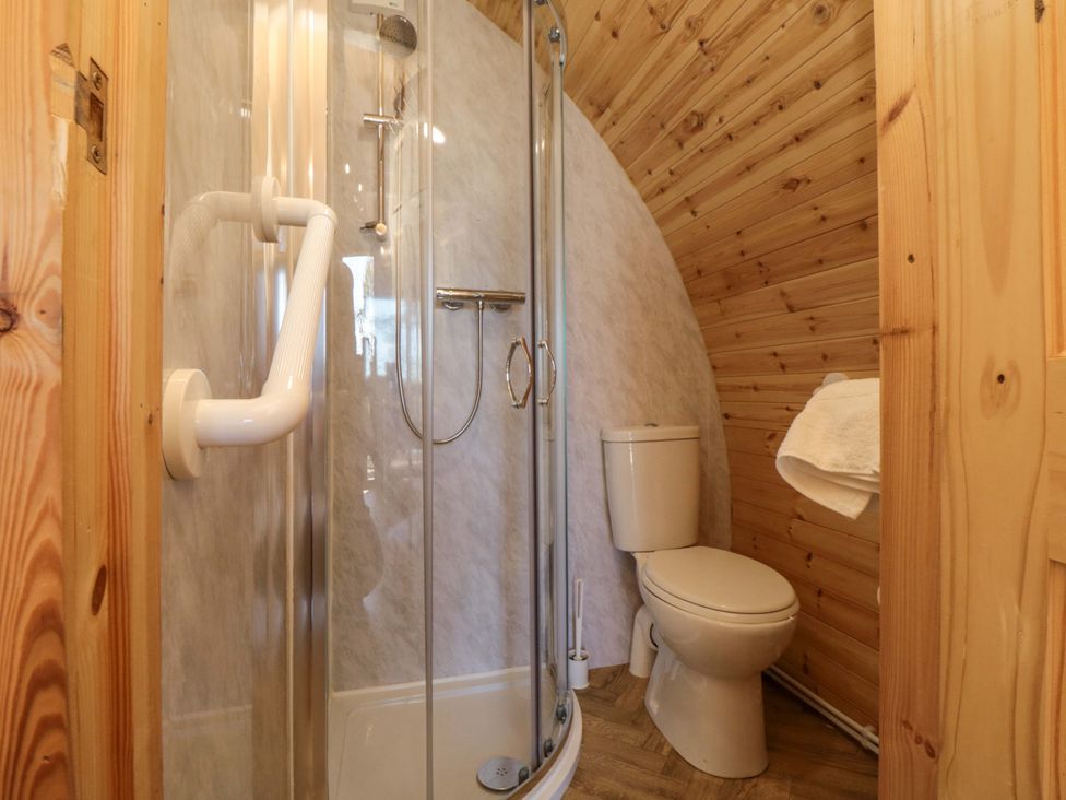 A bathroom with a shower and toilet at Rosemary Retreat in Whitby