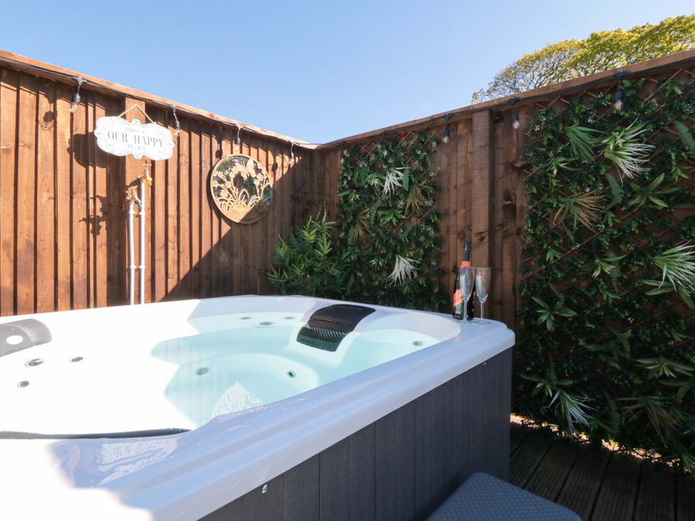 A hot tub in an outdoor area at Rosemary Retreat in Whitby