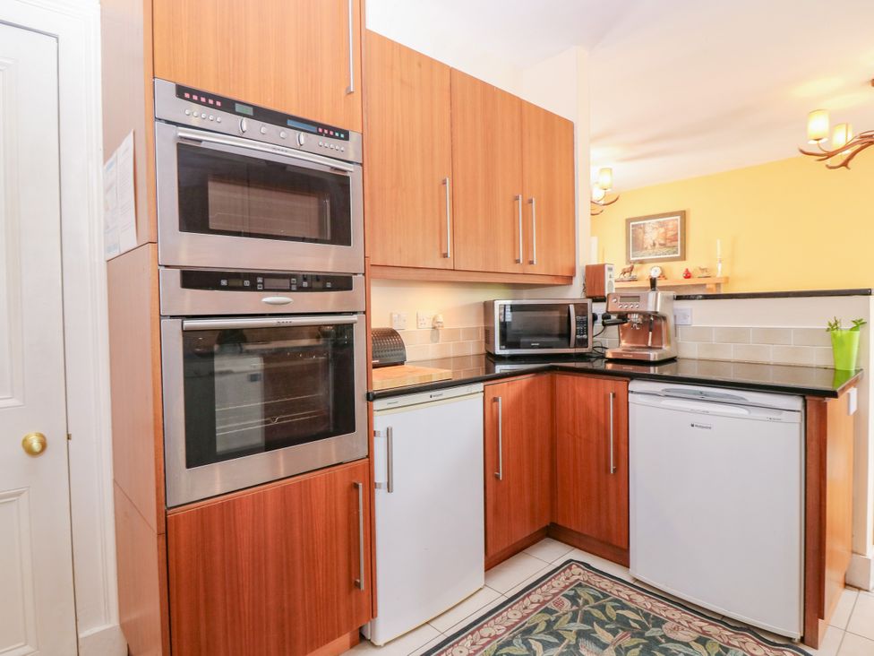 A kitchen with fitted units and appliances at St Kilda in Ballater
