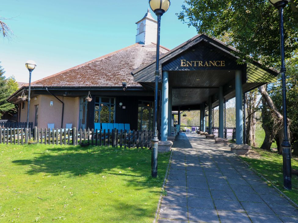 An entrance with a pathway leading to a building at Apartment 1 in Dyce