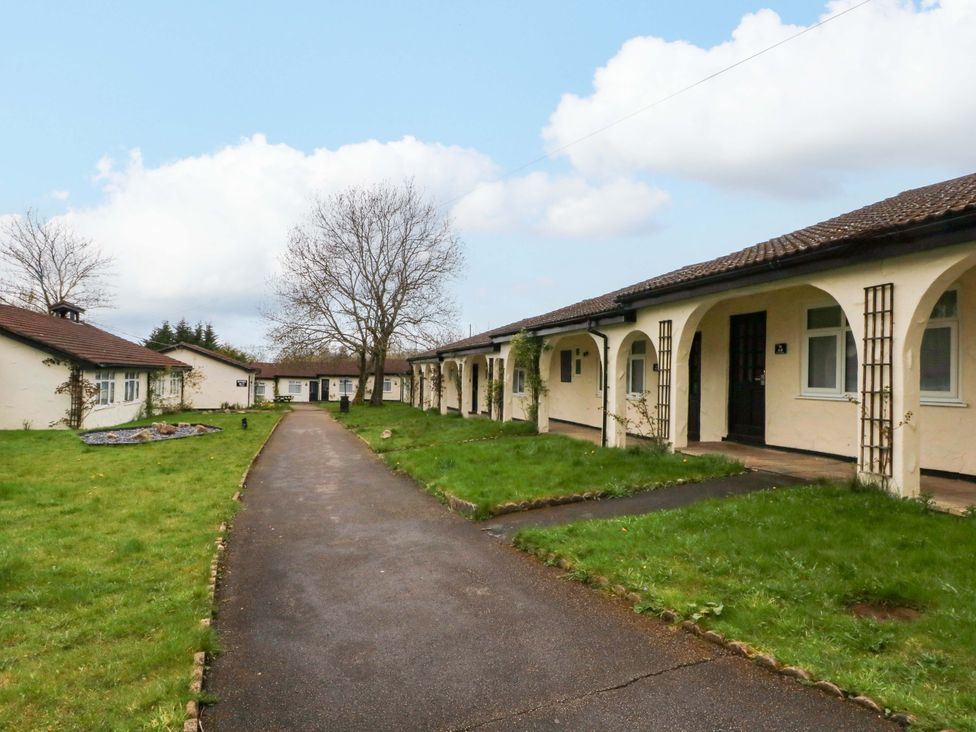 An outdoor area with houses and a pathway at 2 bed no. 2 in Chorley