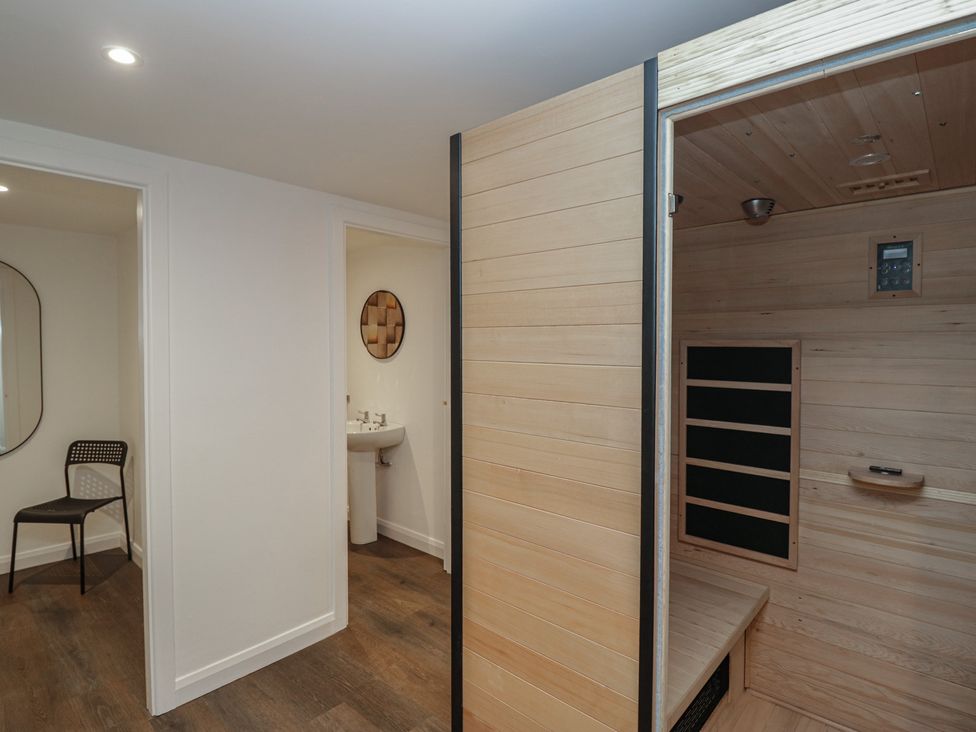A spa area with a sauna and washbasin at Brettargh Holt Mansion near Levens