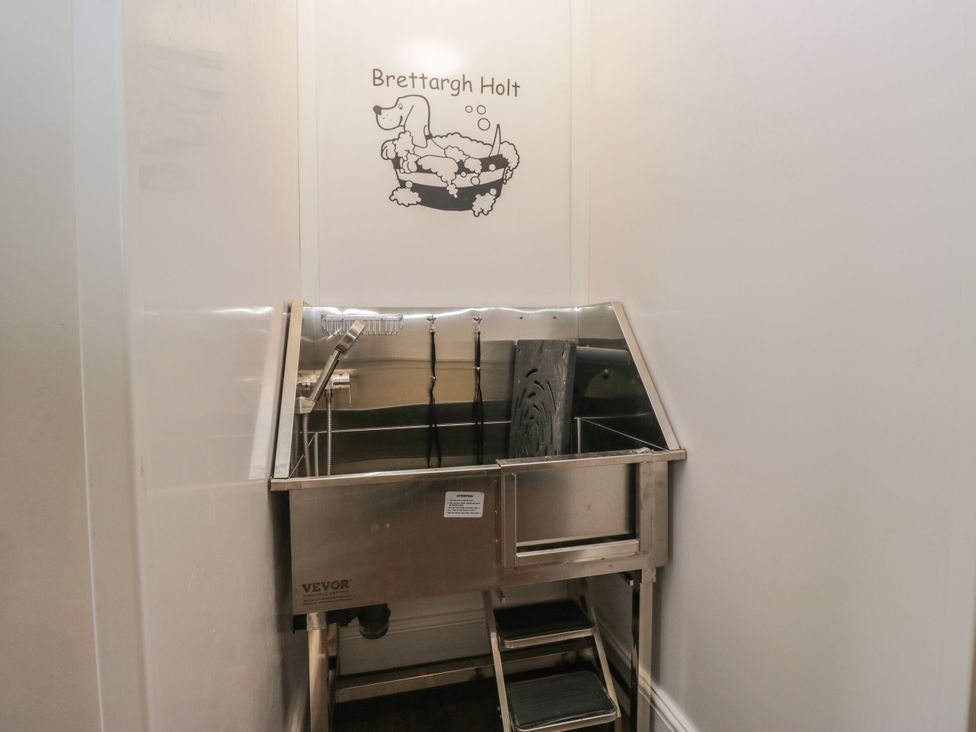 A dog wash station with steps at Brettargh Holt Mansion near Levens