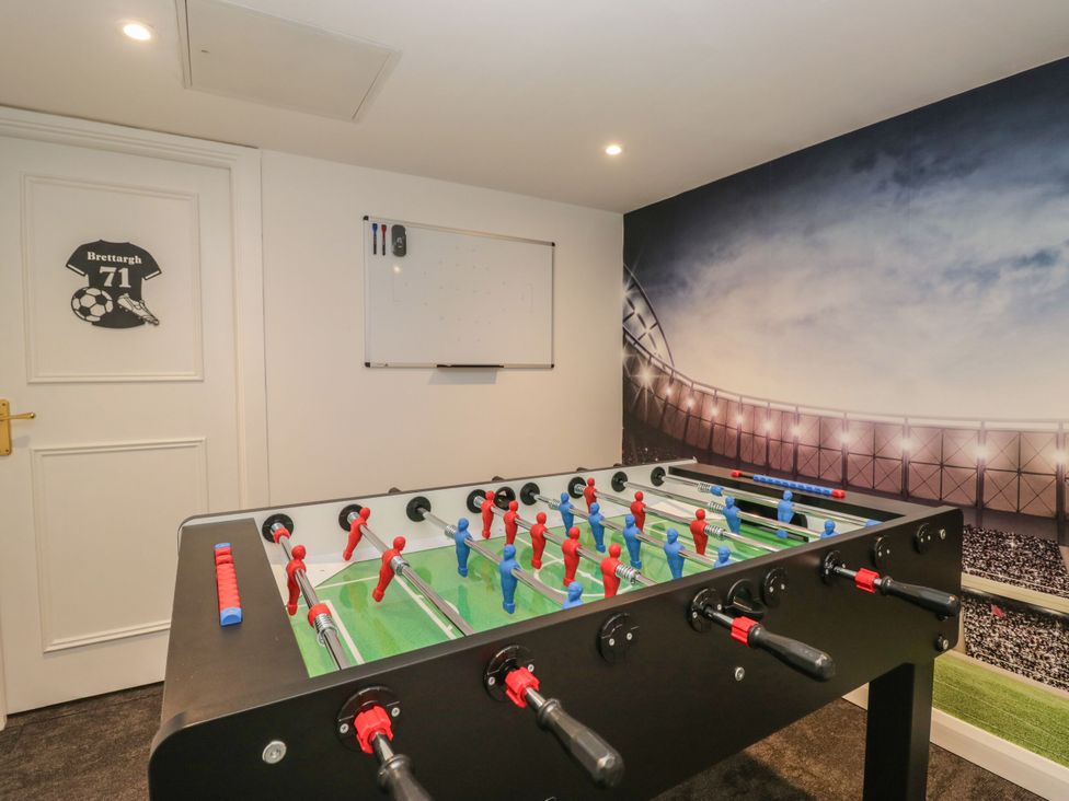 A game room featuring a foosball table at Brettargh Holt Mansion 32 near Levens