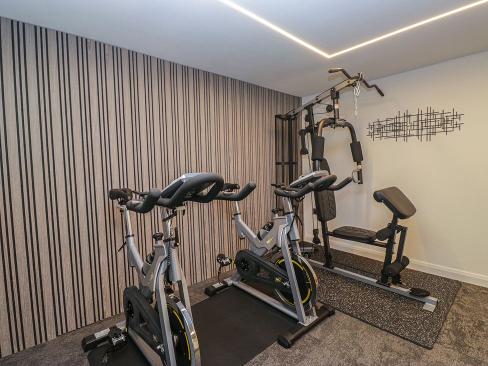 A gym with exercise equipment at Brettargh Holt Mansion 32 near Levens