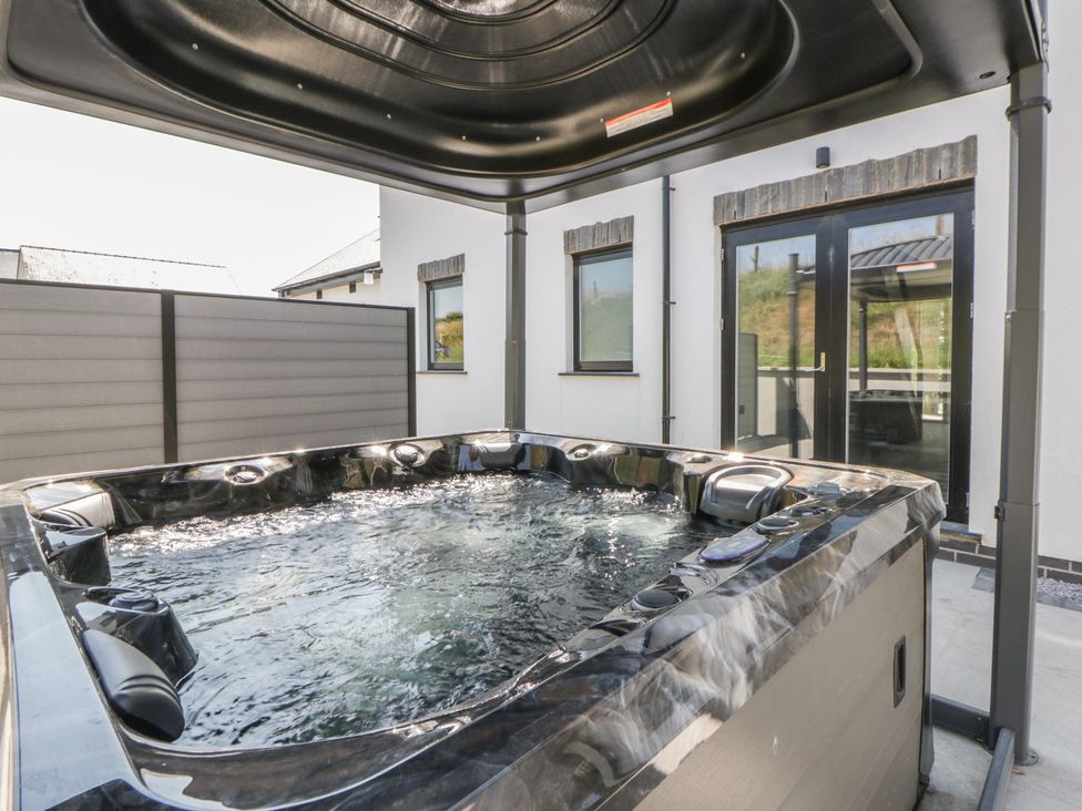 A hot tub in an outdoor area at Brynseion Uchaf near Aberystwyth