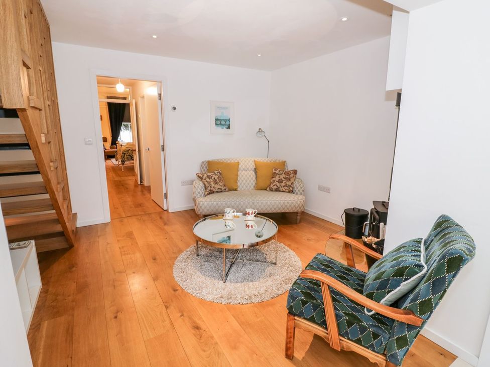 A living room with a sofa and coffee table at Little Mornington in Malvern