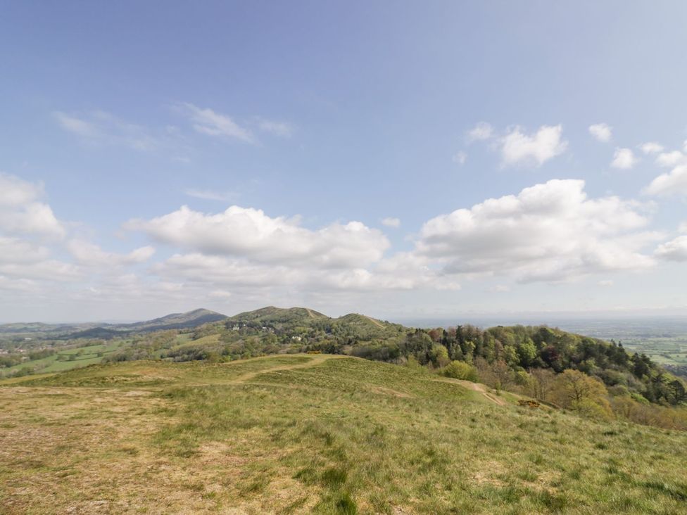 A landscape view of hills and trees at Little Mornington in Malvern