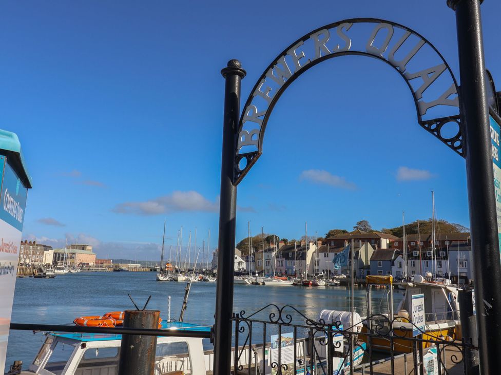 A view of brewers quay with boats and buildings in Weymouth