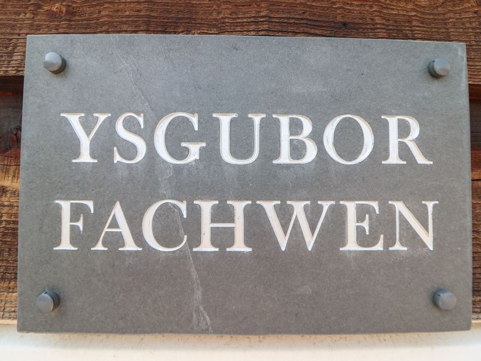 A sign displaying the name Ysgubor Fachwen