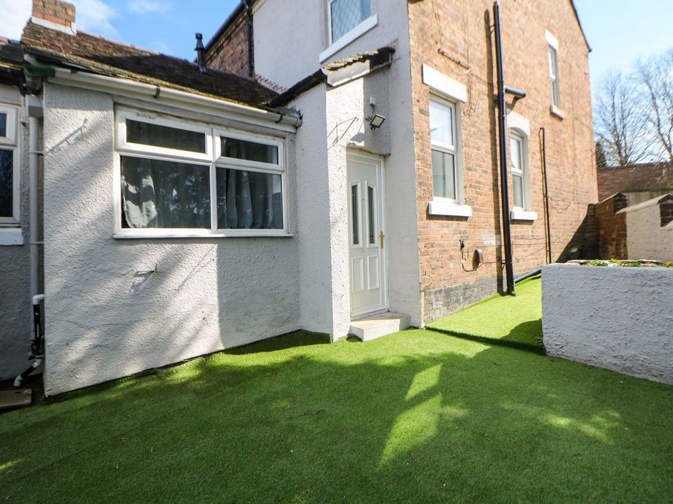 A garden area with a door and windows at 22 Garfield Street Stoke-on-Trent