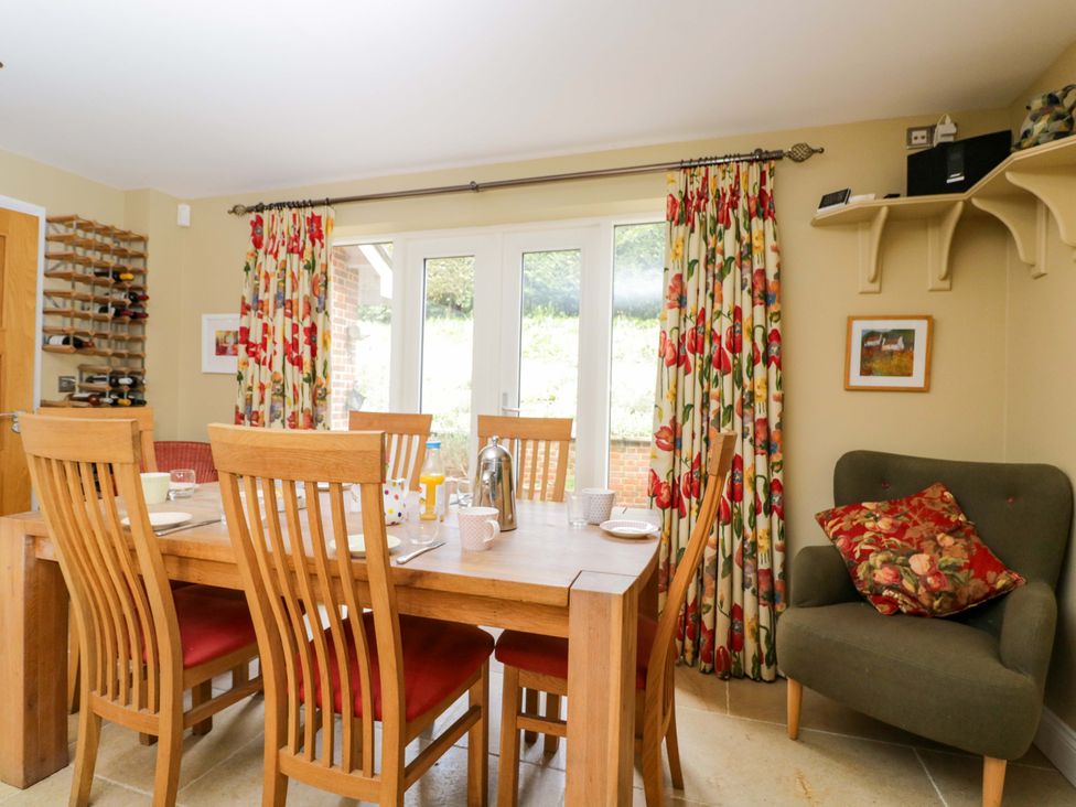 A dining room with a table and chairs at Ormiston House Netheravon