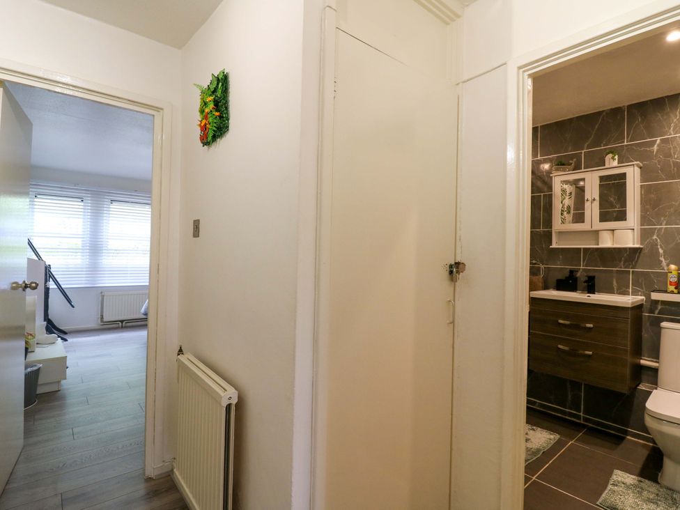 A bathroom with toilet and sink at 22A Warrender Road Tufnell Park