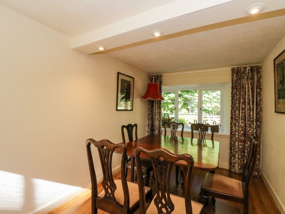 A dining room with a table and chairs at Gardener’s cottage in Stanley