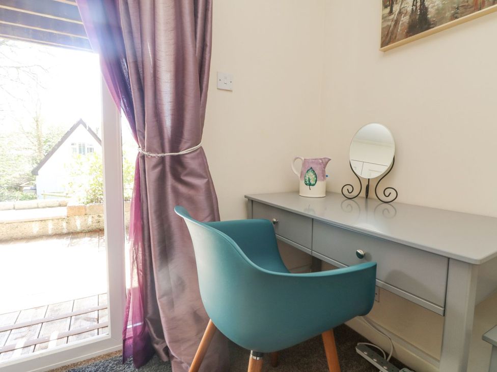 An office with a desk and chair at Honeycombe Lodge
