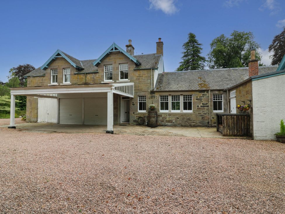 A house with garage and driveway at West House in Perth