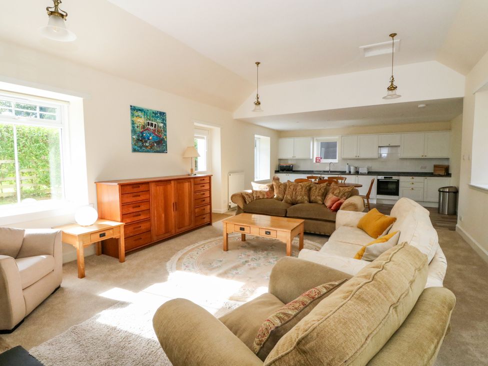 A living room with a sofa and coffee table at West House in Stanley