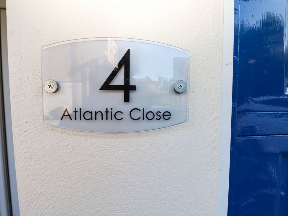 A sign displaying the address 4 Atlantic Close in Southampton