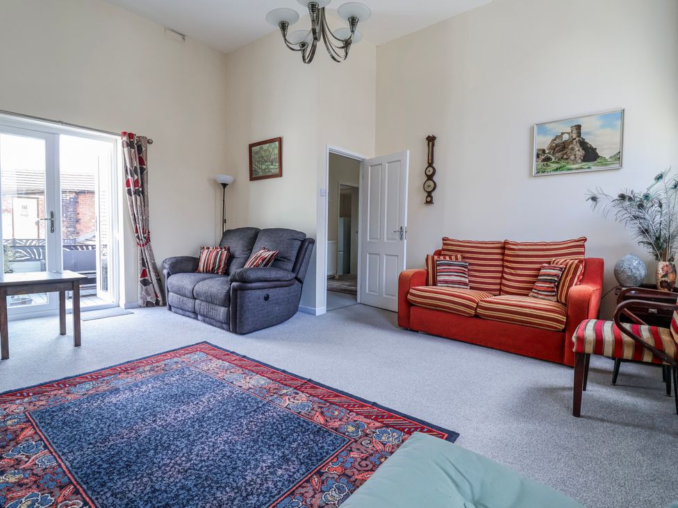 A living room with sofas and a coffee table at Top floor apartment