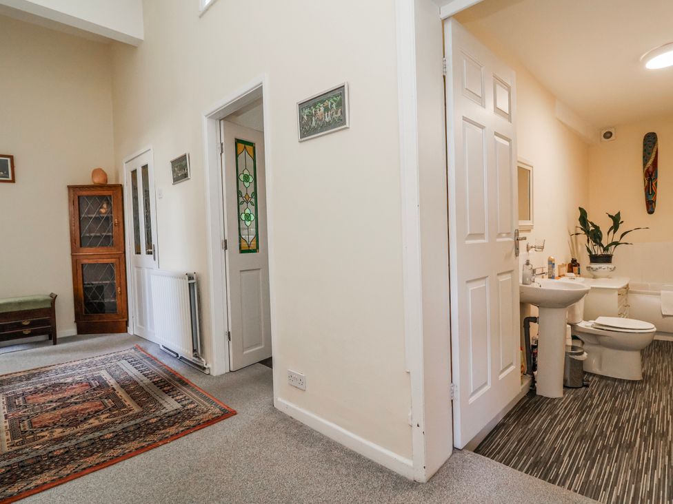 A bathroom with sink and toilet at Top floor apartment in 