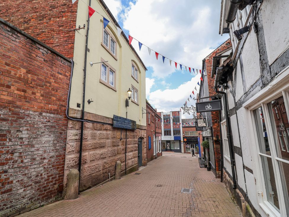A street with buildings and bunting at Top floor apartment in 