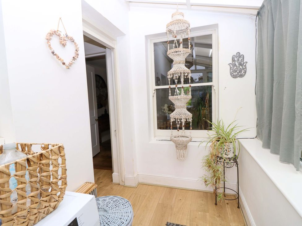 A indoor view with a hanging decor and a plant at Fern Cottage in Bembridge