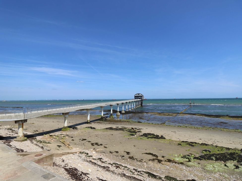 A pier extending over the water at Fern Cottage in Bembridge