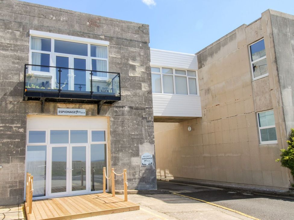 A building exterior with balcony and entrance at Portland View in Portland Bill