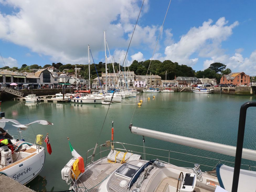 A harbor with boats and buildings at Stowaway Cottage Padstow