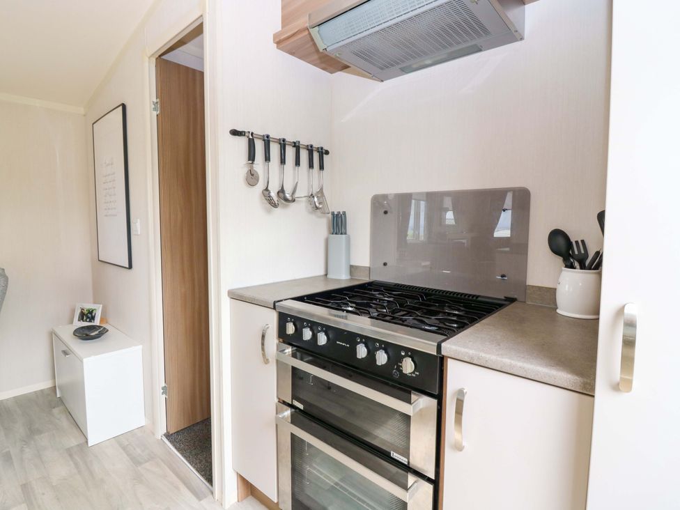 A kitchen with a stove and oven at 18 Eden Heights St Andrews