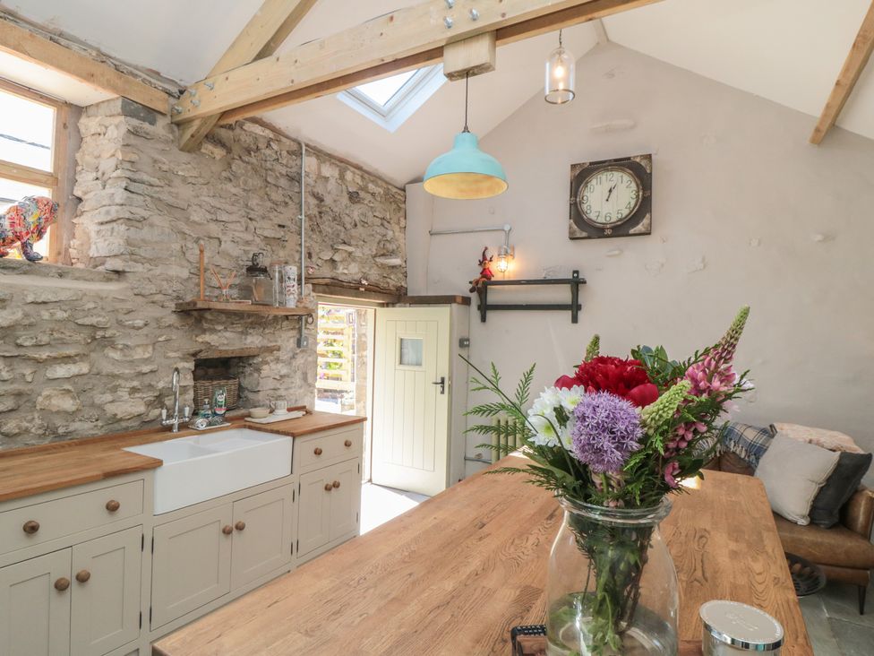 A kitchen with wooden countertops and a sink at 1 bed in York