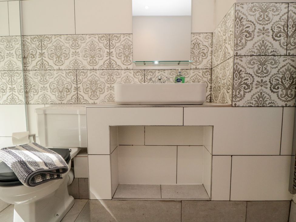 A bathroom with a sink and toilet at 1 bed in York