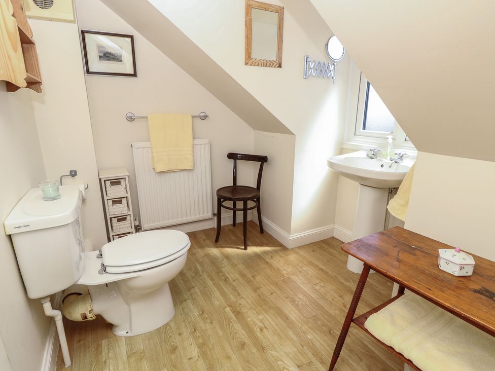 A bathroom with a toilet and sink at Anchorage House Seaview